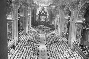 This is a general view of the central nave of Saint Peter's Basilica, transformed into the "hall" of the Roman Catholic Ecumenical Council, during the opening ceremony of the Council on Oct. 11, 1962 in Rome.  All the Council Fathers have taken their seats in the stands erected left and right, while Pope altar, under Bernini's huge bronze canopy, is seen in far background.  (AP Photo/Leslie Priest)