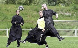 Seminarists from the Seminary of Econe the International Seminary of Saint Pius X, play soccer during a game, in Riddes